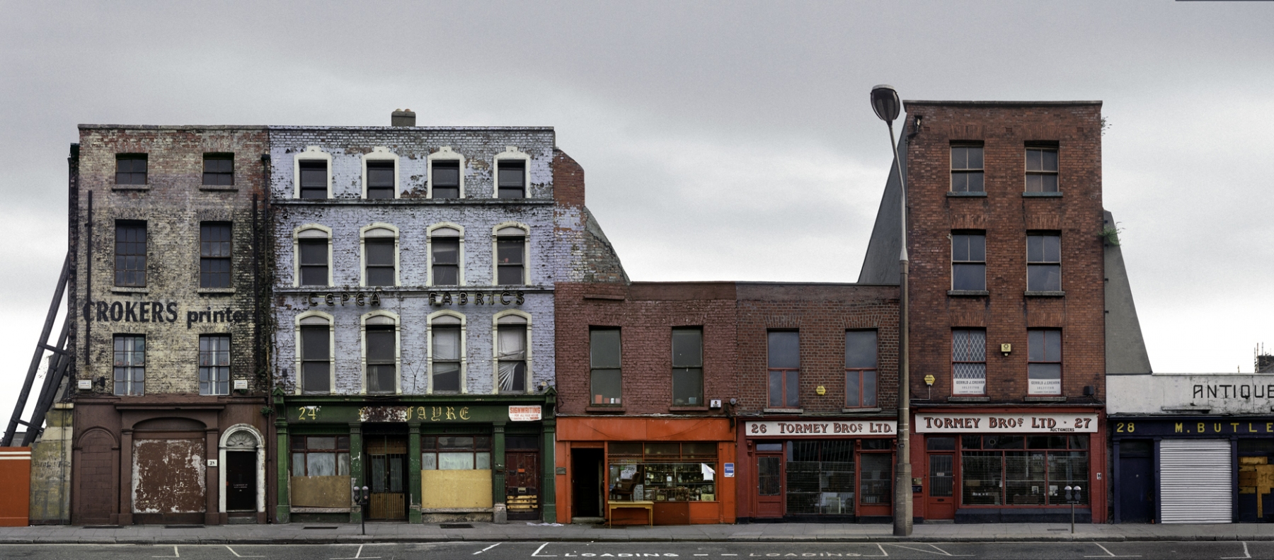 Auction House and Antique shops on Lower Ormond Quay, Dublin 1988 by David Jazay